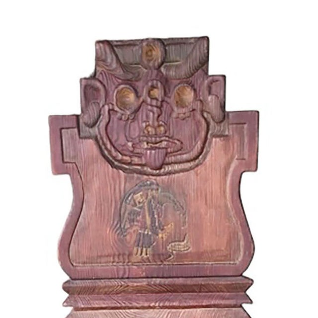 Very rare Indian style chair with carved faces in northwest coast style. Carved wooden snakes on the arms and Kachina...