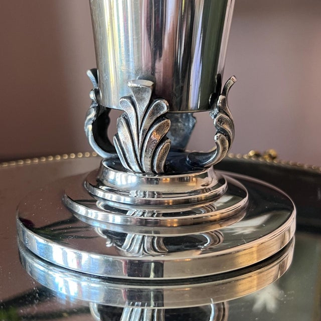 This is a beautiful, possibly antique, trumpet vases in electroplated buckle silver that silver, made by C.G. Hallberg of...