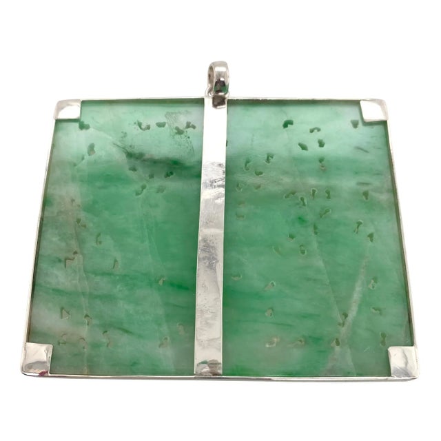 This is part of Chairish’s Fine Jewelry assortment. This is antique carved jade jadeite plaque which has been mounted in a...