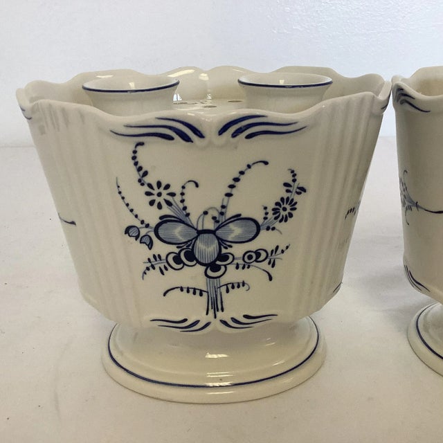 Vintage Home is pleased to present this gorgeous Delft pair of Villeroy & Boch Vases with flower frogs crafted in...