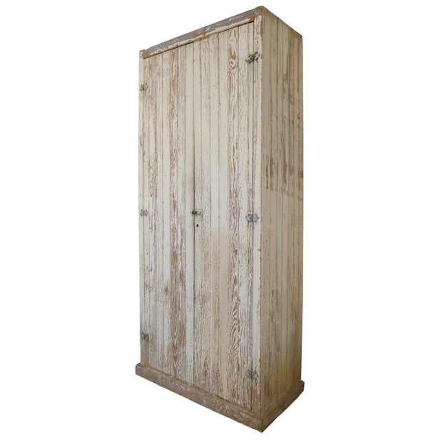 A fantastic, monumental, turn-of-the-century primitive wood cupboard. Wearing its original, now wonderfully-mottled,...