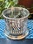 Add old world charm to your table setting with this silver plate over copper condiment holder or jar sleeve. From the...