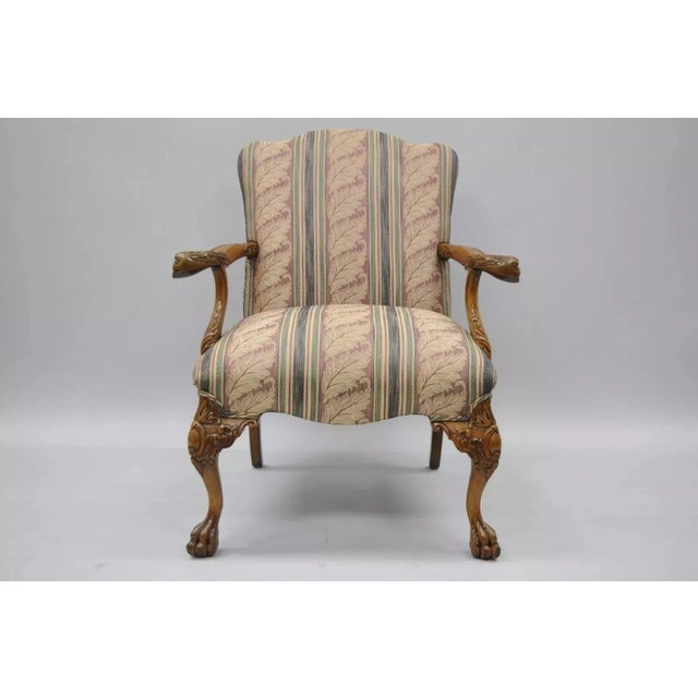 Vintage Georgian Style Carved Mahogany Figural Faces Paw Foot Lounge Arm Chair. Item features solid wood construction,...