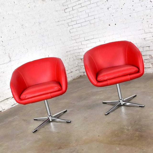 Awesome pair of Shelby Williams mid-century modern swivel bucket chairs with chrome X base. Newly upholstered in bright...