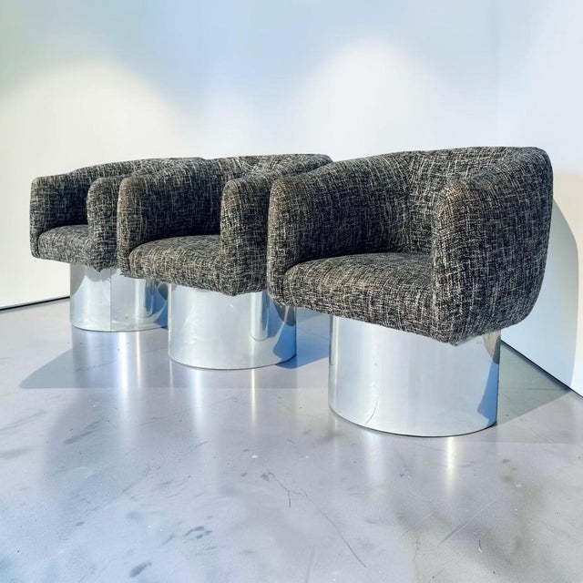 Incredible set of three 1970s swivel tub chairs designed by Leon Rosen for Pace Collection. Chairs sit on a high, polished...