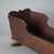 A walnut doll cradle showcases the simplicity and craftsmanship typical of the mid-19th century. The cradle features a...