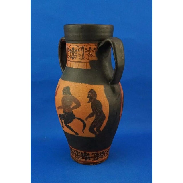 Item description: Wonderful Roman amphora-style vase with two handles, made of terracotta and entirely decorated by hand...