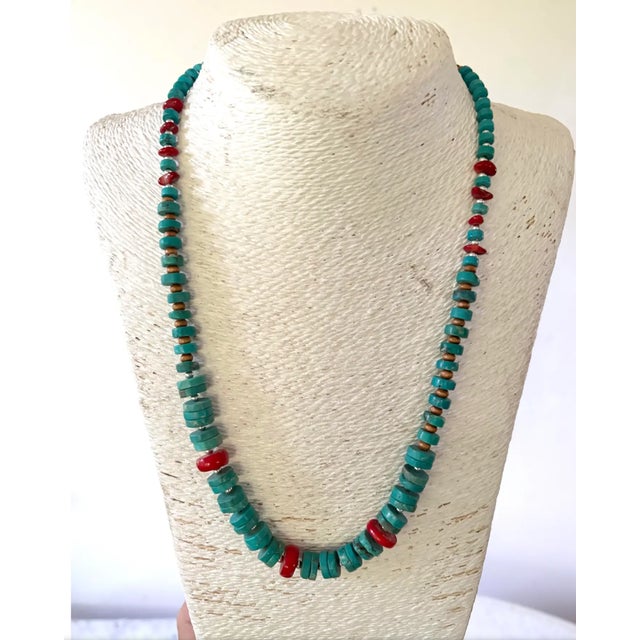 Lovely, vintage turquoise and coral beaded necklace.