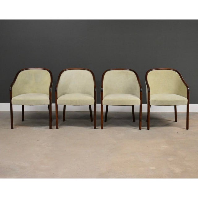 A set of four post modern dining arm chairs designed by Ward Bennett for Brickel Associates. Circa 1970’s. Made in USA....