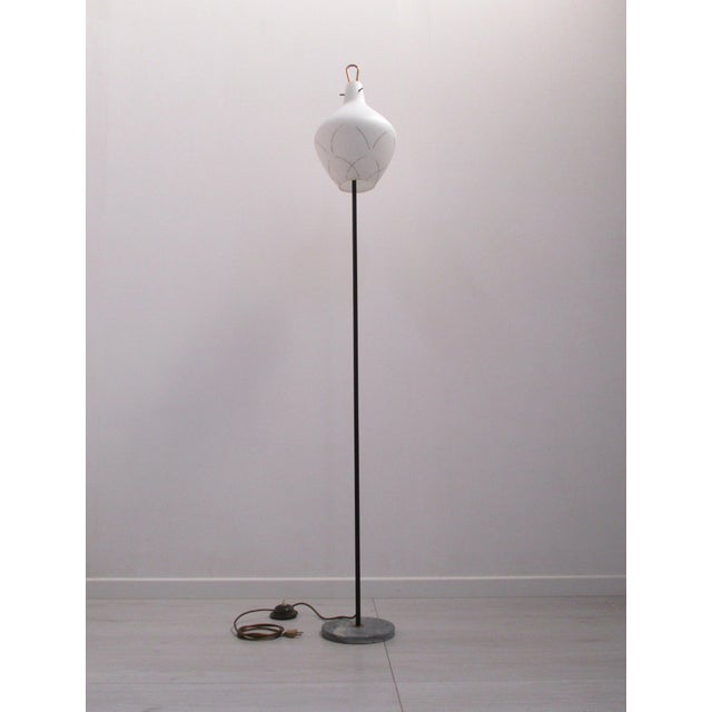 Beautiful floor lamp armchair Italian design stilnovo from the 1950s, Italian manufacture made of metal with brass...