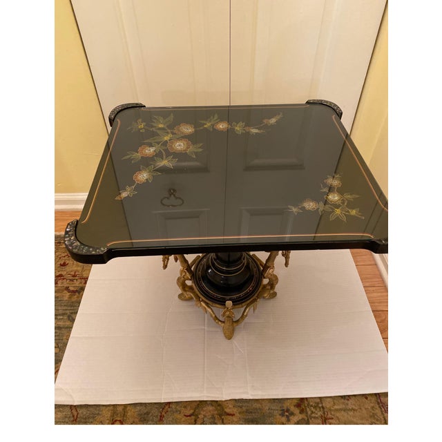 A very chick Aesthetic movement Table from the famous design house Maison Alphonse Giroux. The hand painted black...