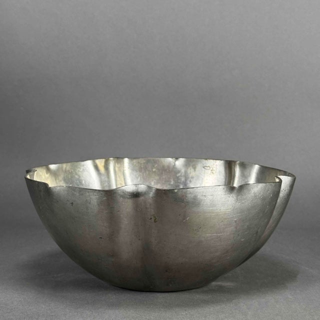 Heavy, beautifully designed 5 petal flower bowl signed by the artist on the bottom. The bowl is approximately 3.5" in...