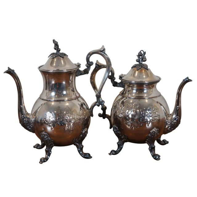 "Vintage Sheridan hand chased silver plate set including tea pot, coffee pot, lidded sugar bowl, and creamer, all etched...