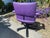 The 1990s Mario Bellini Vitra Figura Post Modern Purple Leather Desk Chair is a stunning piece of furniture that embodies...