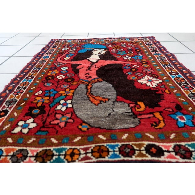 Handmade Vintage Persian Hamadan Rug – Floral & Figurative Design – 2.3' × 2.95' (1970s) This handmade Persian Hamadan rug...