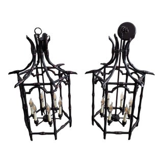 Pair 1970s Large Faux Bamboo Iron Pagoda Suspending Chandeliers For Sale