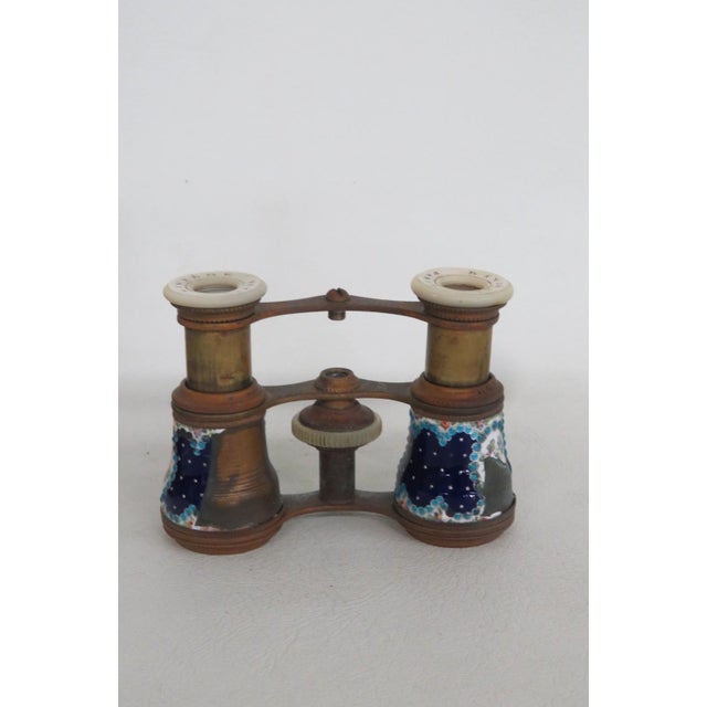 This lovely Opera Glasses / Theatre Binoculars are made out of metal, enamel and mother of pearl, and the case is made out...