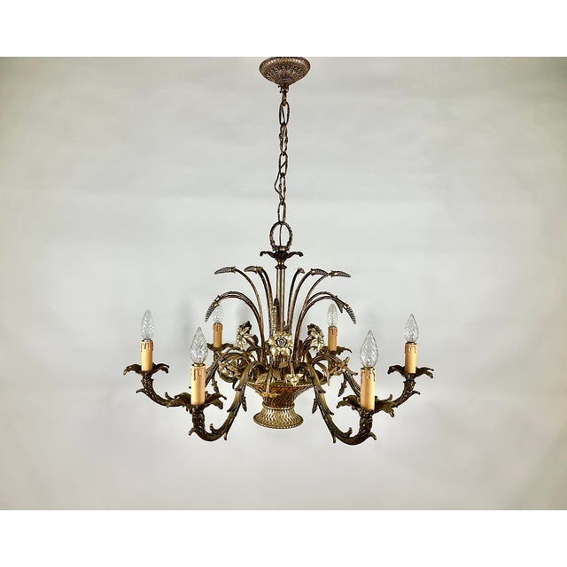 Step into a realm of unparalleled elegance with this breathtaking French bronze chandelier from the 1960s. More than just...