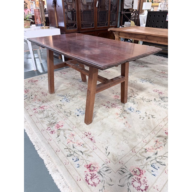 A timeless example of the American Arts & Crafts movement, this vintage Mission dining table showcases the honest...
