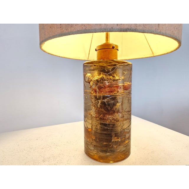 This is a beauty of a lamp, made from resin and and a copper tube that has gracefully left a patina reflected by the...