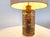 This is a beauty of a lamp, made from resin and and a copper tube that has gracefully left a patina reflected by the...