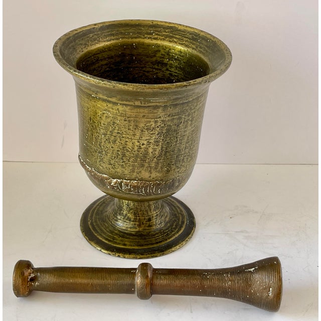 Antique Solid Brass Mortar and Pestle. Very heavy brass, clean and ready to use. Aprox. dimensions: Weight: 5.5 lbs...