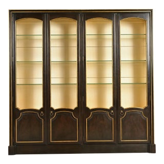 Baker Furniture French Regency Louis XVI Carved Walnut and Parcel Gilt Lighted Breakfront Bookcase Cabinet, Circa 1960s For Sale