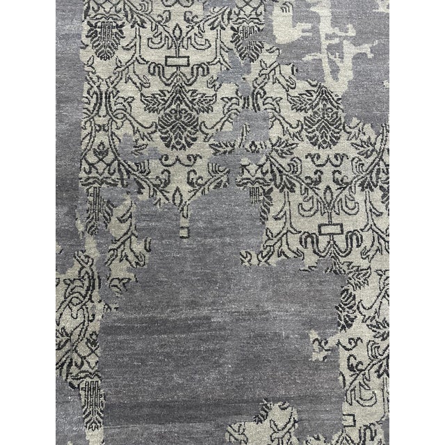 Beautiful hand knotted modern and fashionable collection of borderless designs rug, made of 75% wool and 25% cotton in...
