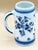 Hand-painted Dutch Delft blue and white stein featuring bold traditional floral decoration in layered cobalt tones on a...