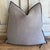 Linen blend accent pillow. Color: Ecorce / lavender - grey colored nubby textured stone washed linen pillow with a black...
