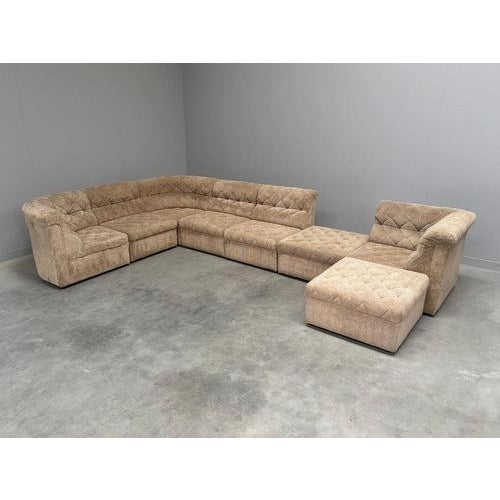 Remarks: Mid century elements sofa by Laauser, Germany 1970s. 8 Elements upholstered in beige fabric. Wooden structure...
