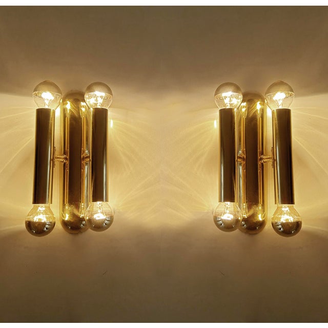 Pair of mid-century brass sconces with each 4 lights, reminiscent of sciolari designs dimensions 9.44 in. H x 5.11 in. W x...
