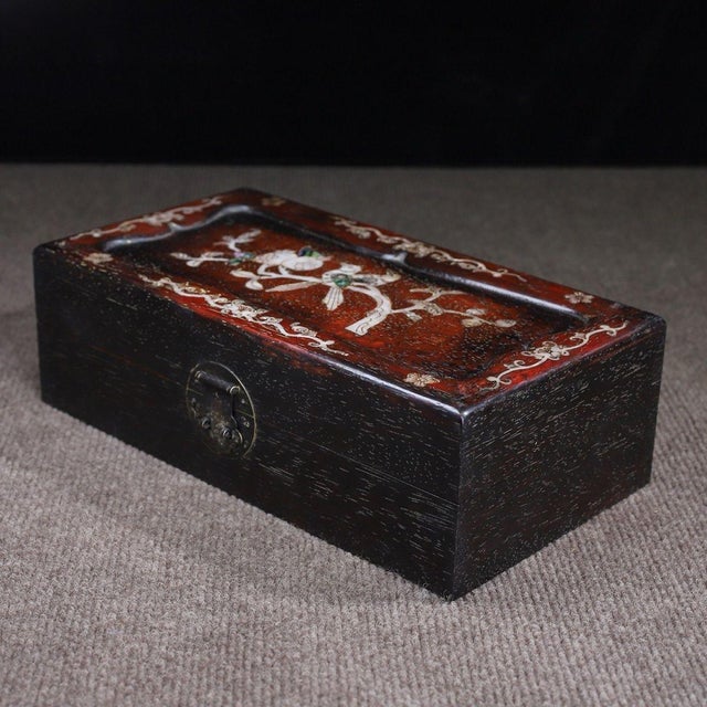 This is an elegant vintage rectangular box, crafted from Zitan wood (purple sandalwood) and decorated with intricate...