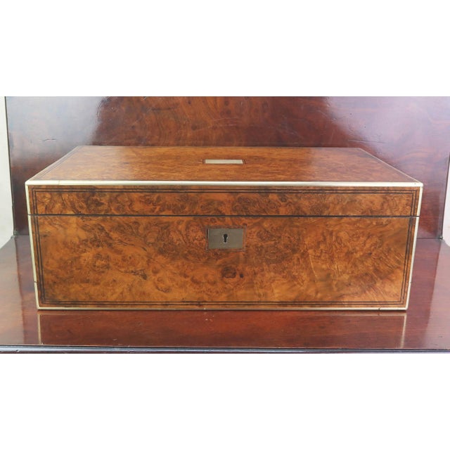 Wonderful burr walnut writing box or slope Fabulous colour and figure in the wood Fine brass hardware and ebony stringing...