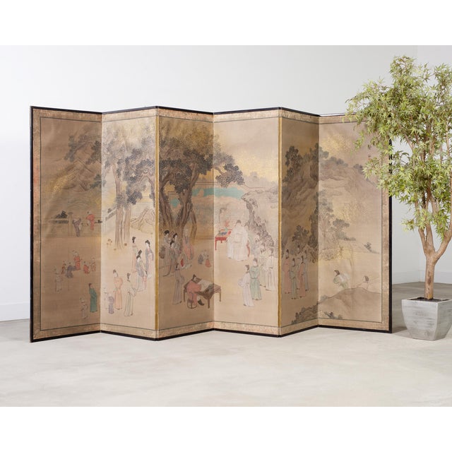 Grand Japanese Edo period six panel folding byobu screen depicting a large gathering of a Chinese official. The painting...