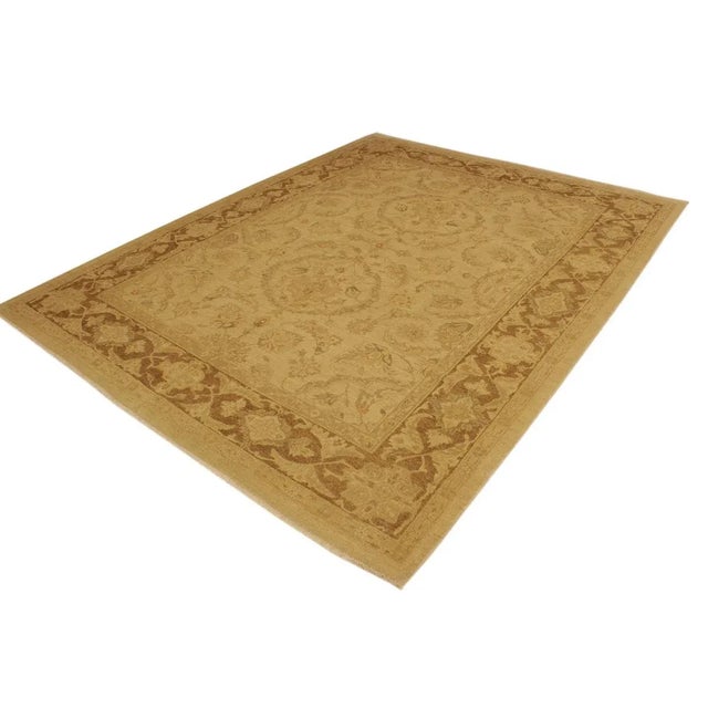 A Persian influenced Turkish hand knotted rug made by skilled artisans capable of creating the most exceptional vegetable...