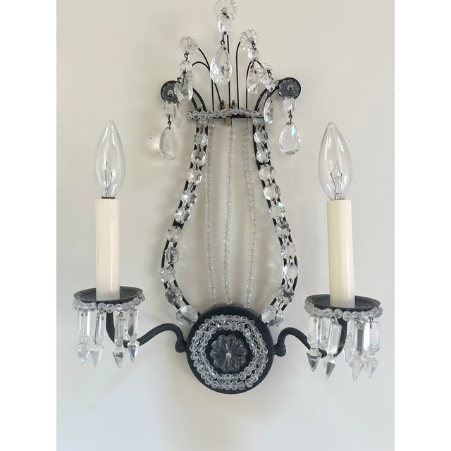 Pair of Classically cool sconces, black with crystal, from an important Chicago building on East Lake Shore Drive. Circa...