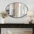 With a minimalist approach, our Steele Mirror features a sleek oval design framed in a flat, shadow box-style stainless...