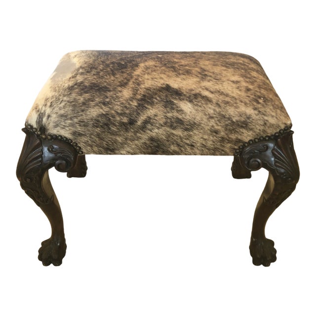 Vintage Carved Mahogany and Cowhide Ottoman For Sale