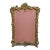 Late 19th C ornate gilded gold French style frame in the Rococo manner with shell crest and two curved front feet, and...