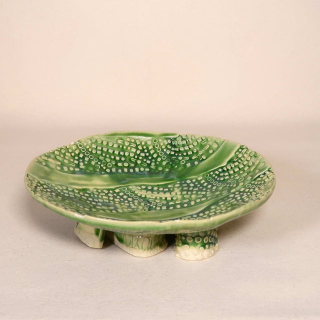 A striking vintage studio pottery bowl featuring an intricate, hand-textured surface with layered dot and line patterns in...