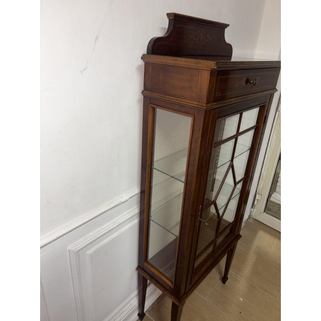 Mahogany display cabinet with brass door and key and glass shelves drawer on top full height 151 cm height without frame...