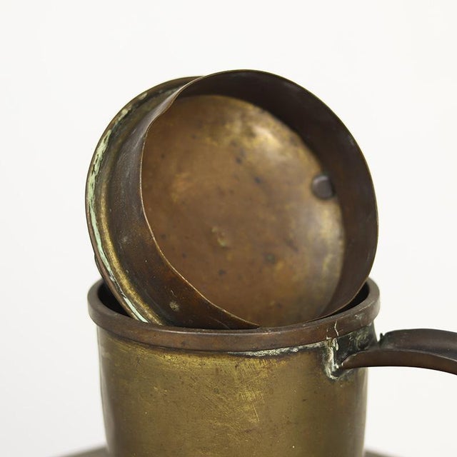 This special antique French milk jug, also known as a canne à lait, was used in the 19th century to transport milk from...