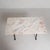 This table can be easily moved in 2 stages. The marble top rests loosely on the cast iron frame. The cast iron frame is...