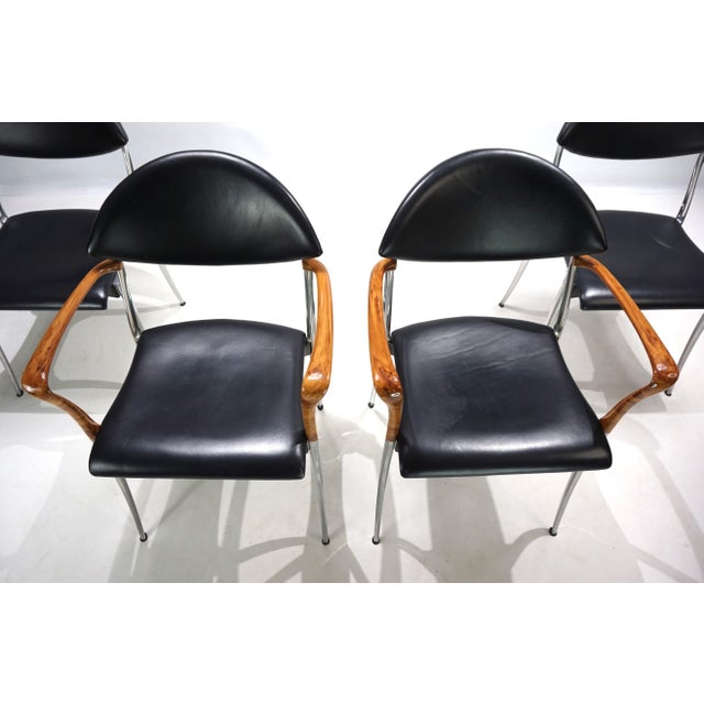 This set of 2 Coro chairs with armrests and 2 chairs without armrests comes in very good condition. The armrests of the...