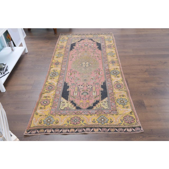 Vintage Turkish Hand-Knotted vintage rug is a semi-antique vintage area rug.'70s Eastern region of Turkey's unique rug is...