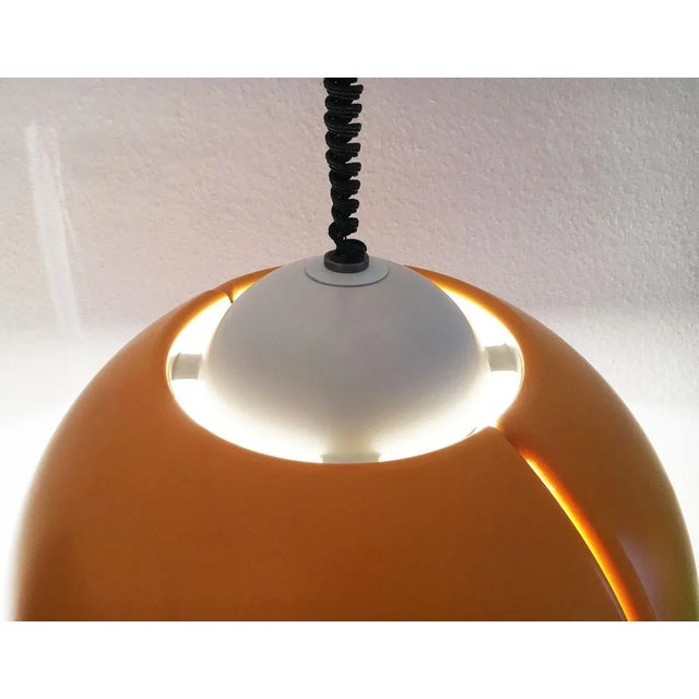 Large plastic train pendant lamp in a striking yellow hue from the renowned manufacturer temde. in addition to the yellow...
