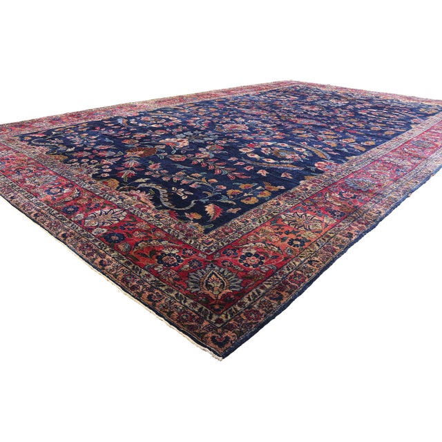 79155 Antique Persian Sarouk Rug, 11'02 x 18'05. This magnificent hand-knotted wool antique Persian Sarouk rug exudes...