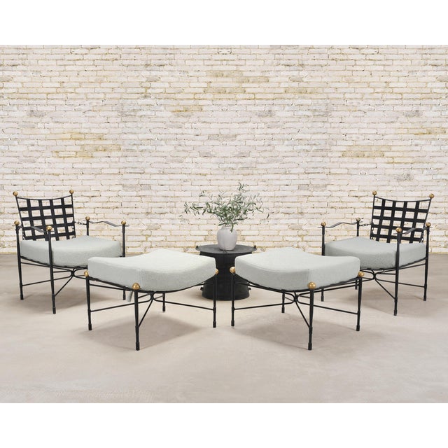 An iconic and rare pair of "Amalfi" lounge chairs and matching ottomans with adjustable chain backs after the mid-century...