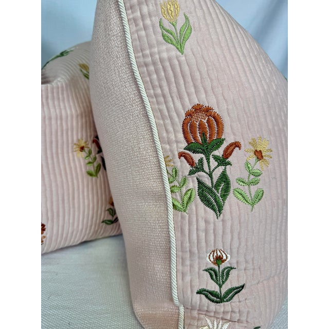 Custom pair of 22" pillows covered in Schumacher "Elmslie Embroidery" in color petal and backed in a coodinating linen....
